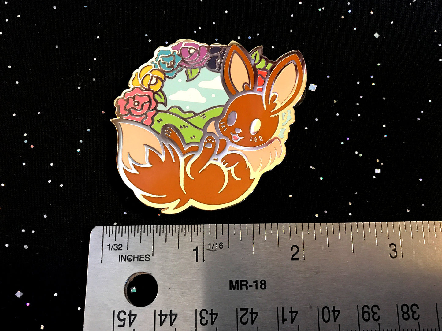 Spinning Eevee Enamel Pin