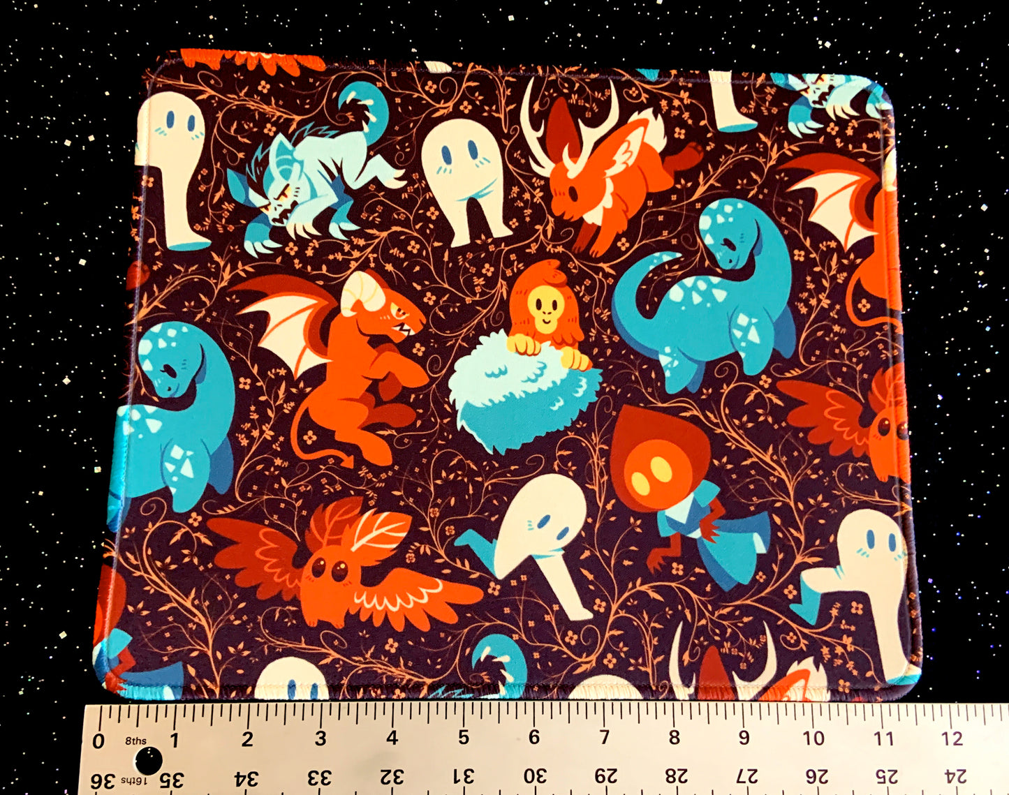 Colorful Cryptids Mousepad