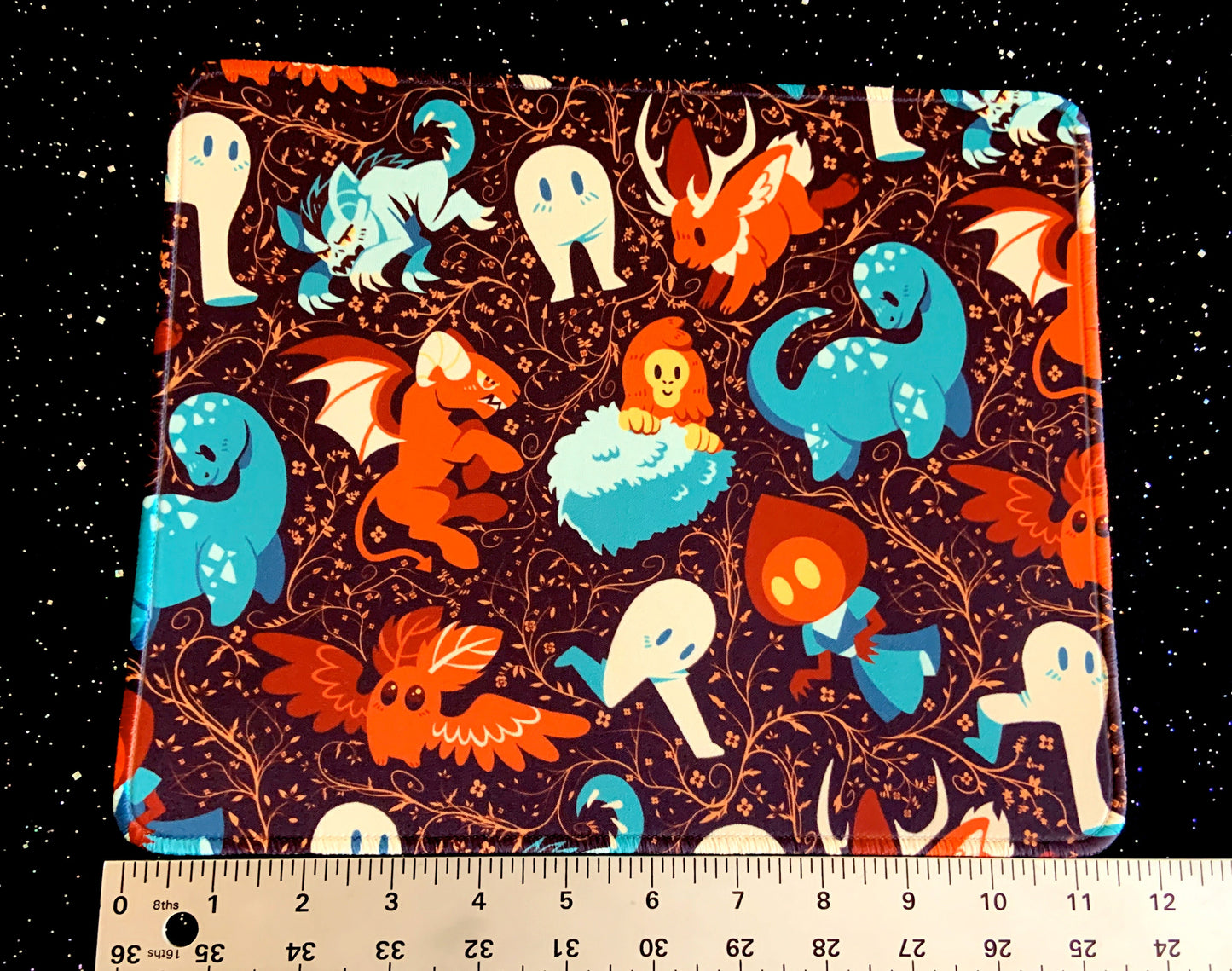 Colorful Cryptids Mousepad